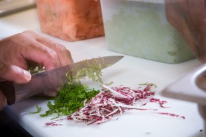 A Chef Chopping Fresh Ingredients